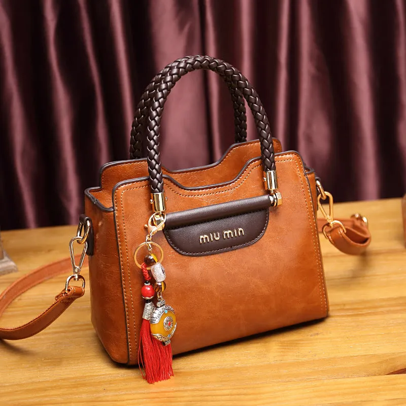 Women's Genuine Leather Fashionable Cowhide Elegant Handbags