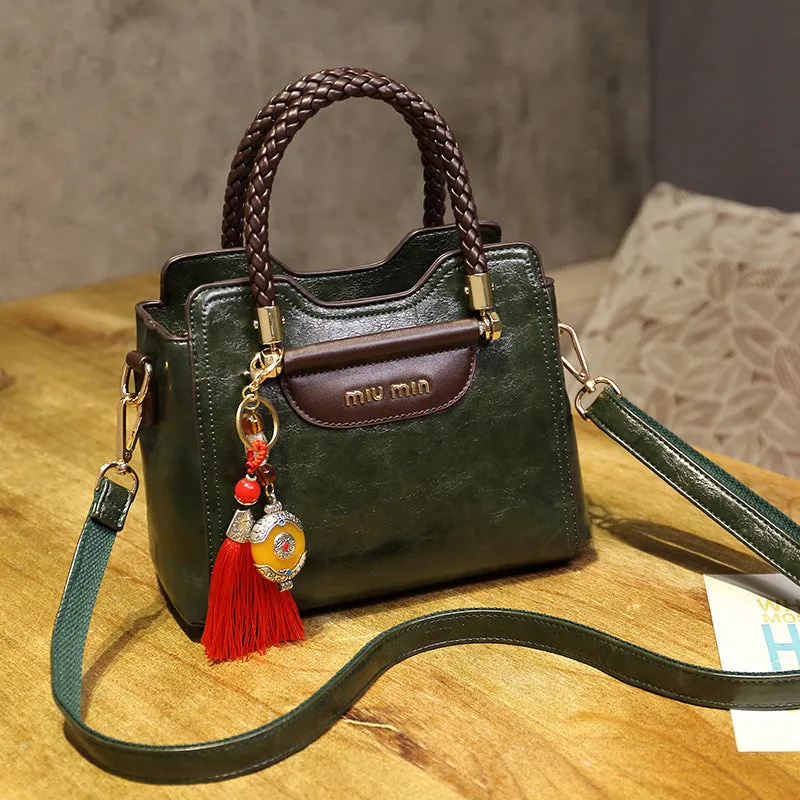 Women's Genuine Leather Fashionable Cowhide Elegant Handbags