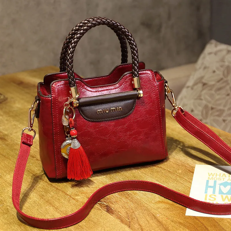 Women's Genuine Leather Fashionable Cowhide Elegant Handbags
